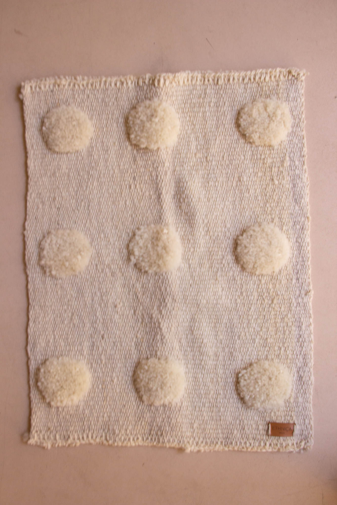 White Pompoms S Rug made of 100% sheep wool 