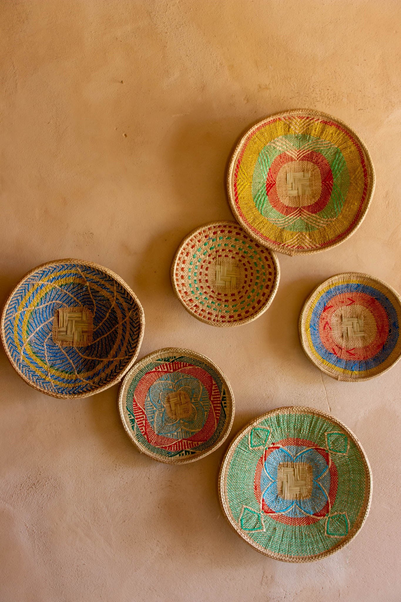 Brick-red and turquoise M Binga african Wall disc