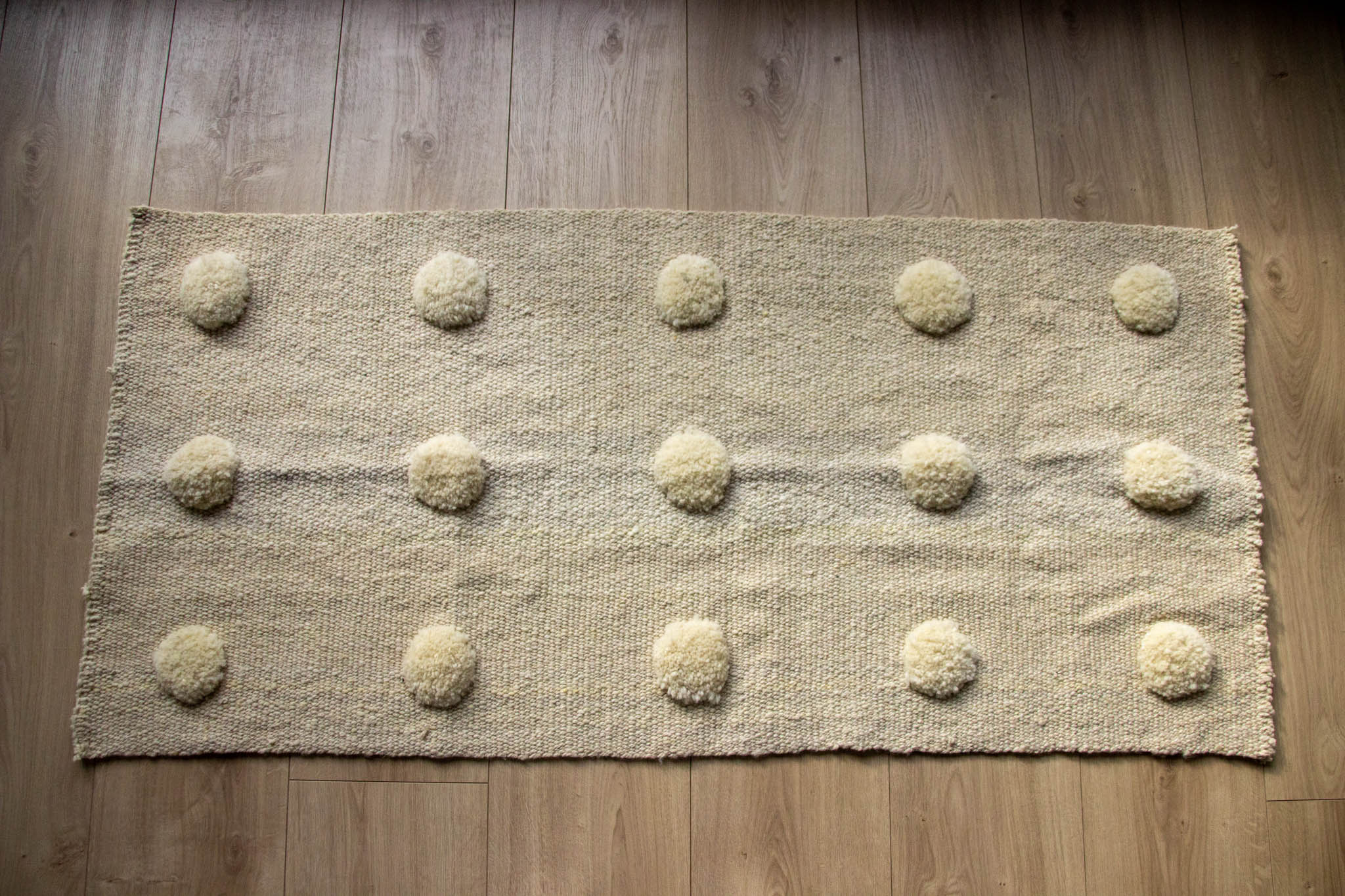 White Pompoms M Rug made of 100% sheep wool 